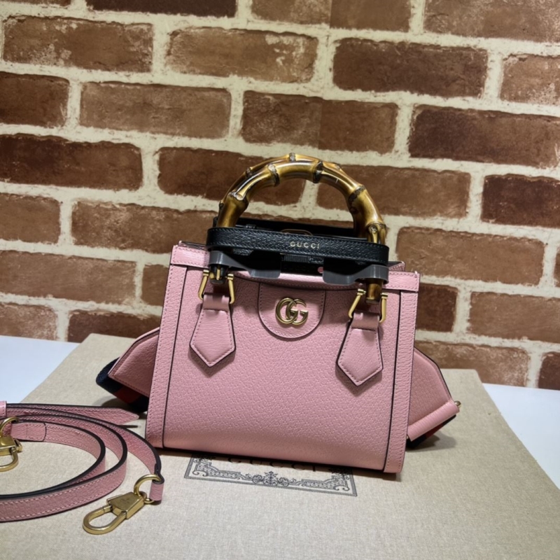 G*u*i top handle bags